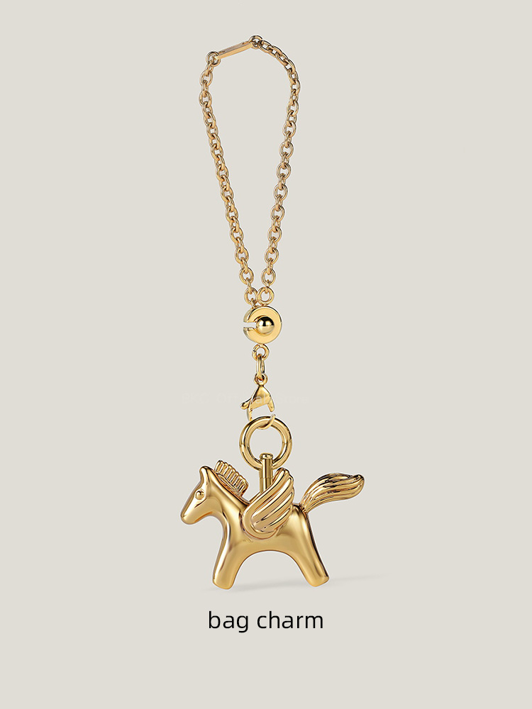 Luxury Brass Pegasus Bag Charm - Luxury Bags Hermes recension och pris